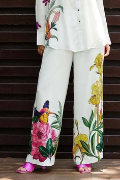 White shirt featuring blossom placement print. Paired with a co-ordinating pant. - Aza Fashions Elegant Printed Spring Bottoms, Spring Printed Sets With Wide Leg, Spring Printed Wide Leg Sets, Spring Printed Sets With Long Pants, Printed Sets With Long Pants For Spring, White Floral Print Sets For Workwear, White Floral Print Sets For Spring, Spring Wide Leg Printed Sets, Elegant White Printed Bottoms