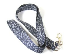 This cute lanyard has beautiful stars which glows like neon in dark. It is perfect for any occasion. You can leave me a convoy if you need a different size. This lanyard comes with breakaway clasp too. If you need one please let me know. You can have a wardrobe of lanyard to match your outfit. This lanyard is made of soft 100% cotton fabric to give a comfortable feel around your neck. This lanyard is easy to take care. You can spot clean and throw in a washer and hang dry. If you want you can ir Wrist Lanyard Aesthetic, Aesthetic Lanyard, Lanyard Blue, Cute Lanyard, Beautiful Stars, Stars Fabric, Cute Lanyards, Space Fabric, Fabric Lanyard