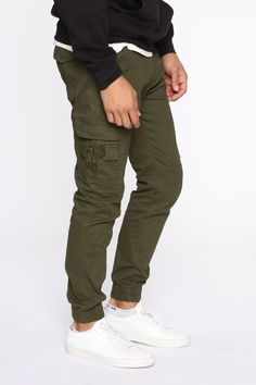 Available In Black, Khaki, Olive, And Camouflage Button Closure Zip Fly Cargo Pants Elastic Hem 31 Inseam 98% Cotton 2% Spandex Imported | Mens Kryptonite Cargo Pants in Olive Green size 32 by Fashion Nova Slim Cargo Pants, Olive Fashion, Streetwear Shop, Button Down Shirt Mens, Mens Pants Fashion, Loungewear Set, Sweater Sale, Shop Mens Clothing, Mens Activewear