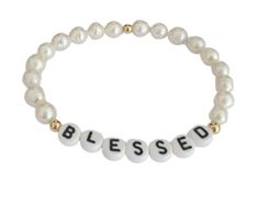 Embrace your blessings with this stunning Pearl Bracelet. Each delicate Pearl represents a symbol of purity, wisdom, and spiritual growth. Let this beautiful piece serve as a constant reminder of the blessings that surround us and the infinite potential within. 8mm quality freshwater pearls gold plating stretch bracelet handmade available in a variety of sizes Meaningful White Jewelry With Letter Beads, Meaningful White Beaded Hypoallergenic Bracelets, Inspirational White Bracelet With 8mm Beads, Meaningful White Hypoallergenic Beaded Bracelets, Elegant 8mm Beads Jewelry For Blessing, Classic White Name Bracelet As Gift, Meaningful Hypoallergenic White Bracelets, Everyday Inspirational Round Bead Jewelry, White Spiritual Rosary Bracelet For Everyday