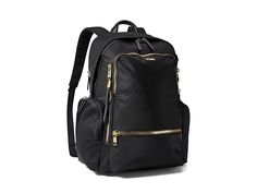 Tumi Voyageur Celina Backpack - Backpack Bags : Black/Gold : Designed to make every journey (and commute) easier, the Tumi Voyageur Celina streamlined backpack has space for a laptop, interior multifunction pockets and exterior zip pockets for easy access to essentials. Nylon and leather construction. Zippered closure. Handle on top. Part of the Voyageour collection. Adjustable shoulder straps for easy carrying. Zippered laptop compartment. Two media pockets. Exterior zippered pockets for easy a Elegant Rectangular Travel Backpack, Elegant Travel Backpack With Adjustable Strap, Classic Backpack With Gold-tone Hardware For Travel, Classic Travel Backpack With Gold-tone Hardware, Elegant Travel Backpack With Gold-tone Hardware, Elegant Travel Backpack, Classic Black Backpack With Gold-tone Hardware, Black Backpack With Removable Pouch For Trips, Rectangular Leather Backpack With Gold-tone Hardware For Travel