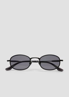 A sleek, round metal frame. Affordable Round Frame Metal Sunglasses, Modern Metal Frame Round Sunglasses, Black Sunglasses With Metal Frame And Glass Lenses, Silver Round Frame Metal Sunglasses, Gray Polycarbonate Sunglasses With Tinted Lenses, Bonnie Clyde, Fashion Sunglasses, Metal Frame, Sleek