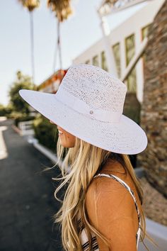 Our Palm Desert Panama fit in perfectly on our latest road trip photo shoot. Stunning, classic, chic - everything you've ever wanted in a hat. Featuring a molded crown with a pinched 10cm brim and hand woven straw, it's crystallized on the tone on tone ribbon with a simple Swarovski rivet. -Rancher style hat with a chill & casual vibe-Brim is flexible but holds its shape-Coordinating ribbon band-Pinched top-Great quality-- will last forever-This color actually goes with everything effortless Beach Boater Hat With Structured Crown, Casual Spring Hat With Structured Crown, Structured Crown Straw Hat For Summer, Straw Hat With Structured Crown For Vacation, Elegant Everyday Boater Hat For Spring, Structured Crown Summer Hat For Vacation, Elegant Spring Panama Hat With Upf 50+, Elegant Panama Straw Hat With Upf 50+, Elegant Straw Panama Hat With Upf 50+