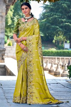 Fancy Silk Saree with blouse in Limegreen and Mehandi 6212 Get ready for Festive with our stunning Banarasi Silk Sarees. Each saree is a blend of tradition and contemporary fashion, designed to make you shineDesc:  Color : Limegreen and Mehandi Fabric :  Fancy silk saree Work :  embroidery   Blouse work: raw silk embroidery Wash Care : Dry clean Sleeve Style : Half Sleeve Long Sleeves : Done only in Custom Stitch Sleeves Lining : Done only in Custom Stitch Bust Size : 32 to 42 Inches Occasion : Wedding   Festival   Kitty Party   Sangeet   Party Wear   Engagement   Reception   Ceremonial. With Express Free Shipping and Custom Stitching, Buy Indian Party wedding and bridal Sarees Fancy Silk Saree with blouse in Limegreen and Mehandi 6212 online in USA, UK and Canada from Latest Wedding Saree Collection, Sari Design, Latest Saree, Wedding Saree Collection, Designer Silk Sarees, Color Party, Party Sarees, Fancy Blouse, Wedding Saree Indian