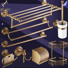 gold bathroom accessories including toilet paper, soap dispenser, and towel rack