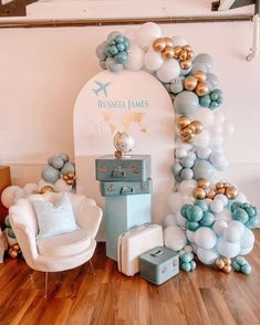 a room filled with balloons and furniture