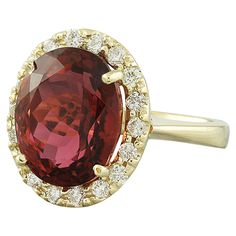 Stamped: 14K Total Ring Weight: 6 Grams Tourmaline Weight 8.39 Carat (13.50x11.00 Millimeters)Diamond Weight: 0.55 carat (F-G Color, VS2-SI1 Clarity )Face Measures: 17.50x14.90 Millimeter SKU: [601143] Gia Certified Tourmaline Rings For Formal Occasions, Formal Gia Certified 14k Gold Ruby Ring, Classic Formal Gemstones With Accent Stones, Classic Tourmaline Ring With Prong Setting, Formal Oval Topaz Ring Gia Certified, Gia Certified Oval Topaz Ring For Formal Occasions, Oval Gia Certified Topaz Ring For Formal Occasions, Formal Tourmaline Round Cut Rings, Formal Tourmaline Ring Fine Jewelry