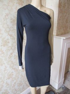 "Black evening sheath dress with one sleeve.  The cuff is a fabulous diamante cuff. Close fitting and in excellent condition.  It has a bit of stretch.  Bust, flat;  unstretched,  17\" Inside sleeve;  24\" Length;  39\" Made by GORGEOUS COUTURE" Fitted One Sleeve Party Dress, Fitted One-sleeve Party Dress, One-shoulder Stretch Mini Dress For Evening, Evening Asymmetrical Stretch Bodycon Dress, Evening One Shoulder Stretch Mini Dress, One Shoulder Stretch Mini Dress For Evening, Asymmetrical Stretch Bodycon Dress For Evening, Stretch One-shoulder Mini Dress For Evening, Stretch Asymmetrical Bodycon Dress For Evening