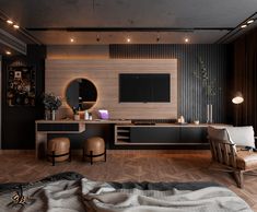 a living room filled with furniture and a flat screen tv on top of a wooden wall