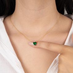 14k Gold Emerald Heart Necklace, Minimalist Heart Shaped Emerald Love Pendant Necklace, Heart Cut Emerald Birthstone Jewelry, Gift for Her Description: Celebrate love and elegance with our stunning 14k Gold Emerald Heart Necklace. This minimalist heart-shaped emerald pendant necklace is crafted from luxurious 14k solid gold and features a beautifully cut emerald gemstone, symbolizing love and vitality. Its sleek and modern design makes it the perfect accessory for women who appreciate timeless and meaningful jewelry. This heart cut emerald birthstone jewelry is an ideal gift for her, whether for a birthday, anniversary, or simply to show appreciation. The vibrant emerald, known as the birthstone for May, adds a personal touch, making it a thoughtful gift for any occasion. Its minimalist de Emerald Heart Necklace, Emerald Heart Gemstone Necklace, Elegant Heart-shaped Green Emerald Necklace, Heart-shaped Emerald Necklace For Gift, Green Heart-shaped Emerald Necklace, Green Emerald Heart-shaped Necklace, Emerald Birthstone Jewelry, Emerald Necklace Pendant, Emerald Birthstone