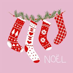 christmas stockings hanging from a branch with the words noel written below them on a pink background