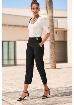 Find the perfect pair: These side buckle pants add a touch of coolness to your look. Summer Workwear Pants With Belt Detail, Chic Tapered Leg Bottoms With Belt Detail, Chic Bottoms With Belt Detail And Tapered Leg, Chic Summer Pants With Belt Detail, Chic Tapered Leg Pants With Belt Detail, Chic Straight Leg Pants With Belt Detail, Chic Office Pants With Belt Detail, Chic Mid-rise Belted Bottoms, Chic Dress Pants With Belt Loops For Business Casual