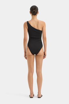 Hendry One Shoulder One Piece – SIR. Fitted Bodysuit With Asymmetrical Neckline For Evening, Evening Bodysuit With Asymmetrical Neckline, Fitted Black One Shoulder Top With Ruched Detail, Fitted Bodysuit With Asymmetrical Neckline For Swimming, Fitted One-shoulder Bodysuit, Elegant One Shoulder Evening Swimwear, Asymmetric Neckline, Black One Piece, Sun Tan