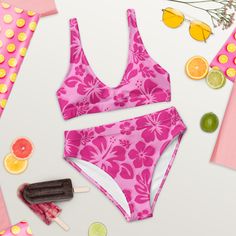 Get ready to make a splash in our Raspberry Pinks Hawaiian Flowers High-Waisted Bikini! This playful and eye-catching swimsuit features beautiful Hawaiian flowers and a high-waisted design for a flattering fit. Say aloha to the beach in style with this fun and fashionable piece. • Double-layered and non-reversible• Removable padding• Tear-away care label• Zig-zag stitching *Separates (Top and Bottom) with this design are listed and sold separately.This product is made especially for you as soon Pink Fitted Hawaiian Swimwear, High Waist Tropical Print Swimwear For Beach, Pink Hibiscus Print Swimwear For Poolside, Pink Hibiscus Print Swimwear For Summer, Fitted High Waist Tropical Swimwear, Pink Hibiscus Print Swimwear For Beach Party, Pink Hibiscus Print Swimwear For Vacation, Pink Hawaiian Swimwear For Poolside, Summer Hibiscus Print Swimwear For Pool