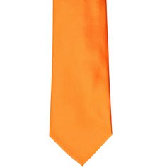 This orange clip-on tie features a pre-tied knot for easy use. It is made from a heavyweight woven material with slight ribbing. Though sized for men, the 3.5-inch width is equally versatile for women and teens, too. Popular for individual use, but priced right for restaurant, staff or other large group attire.We recommend this shade for a basic bright orange. See it in person by requesting a free color swatch. Product Features Traditional 3.5" width, at the widest point Standard men's 20" lengt Classic Orange Ties For Business, Classic Orange Tie For Business, Orange Standard Tie For Business, Orange Standard Business Tie, Orange Business Tie, Restaurant Staff, Tied Knot, Color Swatch, Bright Orange