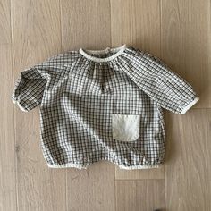 - Plaid long sleeve romper with single pocket- Bottom snap closures for additional comfort and easy diaper change- Available in brown and beige - Made in South Korea  CareMachine wash cold with like colors.Do not Bleach. Hang dry.Cool iron if ne... Brown Long Sleeve Tops For Playtime, Beige Long Sleeve Tops For Playtime, Plaid Romper, Dog Nursery, Hair Socks, Mom Hats, Brown And Beige, Bag Boys, Sleeved Romper