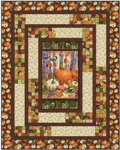 a quilted wall hanging with pumpkins, leaves and other things on it's sides