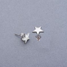 Sterling Silver Tiny Star Stud Earrings , 925 Sterling Silver Star Earrings Push Back , Silver Stud Earring , Dainty Silver Star  Earring * Materials: Sterling Silver * Color: Silver * Earring Style Cut: Star Stud Earring * Size:9 mm * Quantity: One pair * Made to Order These 925 sterling silver minimalist earring perfect for daily wear. Their simple and stylish design makes the mealy to pair with an outfit. Made from high-quality silver, they are durable and comfortable, perfect for everyday us Simple Silver Earrings Studs, Sterling Silver Star Earrings, Simple Silver Earrings, Star Earring, Silver Star Earrings, Minimalist Earring, Star Stud Earrings, Tiny Star, Star Earrings Stud