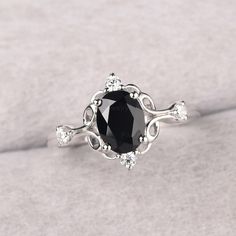 ◆ The ring is handcrafted from sterling silver and decorated with a dazzling 8*6 mm black spinel and CZs. It is suitable for engagement/anniversary/daily occasion. ◆ Production Description: Main stone Type: Natural Black Spinel Main Stone Shape: Oval Cut Main Stone Size: 8*6 mm(1.45ct) Side stone: CZ Metal: 925 Sterling silver - Other options available in the drop down menu ◆ Customization: √Free for Add Engraving √Other Metal Type Available √Other Gemstones & Shapes Available √Personalization R Gothic Promise Rings For Her, Black Diamond Engagement Ring Silver, Vampire Engagement Ring, Christmas Wedding Ring, Ring With Black Stone, Wedding Rings Black, Black Sapphire Ring, Engagement Ring Black, Gothic Engagement Ring