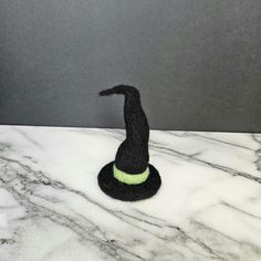 This is a handmade needle felted black crooked Witch Hat with a green band. Handmade Black Mini Winter Hats, Handmade Black Mini Hats For Winter, Handmade Black Mini Hats With Curved Brim, Handmade Black Brimmed Mini Hat, Handmade Black Felt Hat For Winter, Felted Witch Hat, Felted Witch, Felt Witch Hat, Felt Art