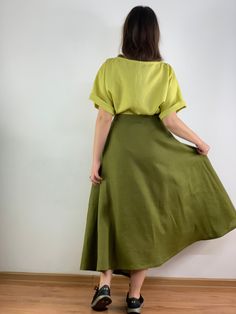 "Handmade olive color linen long wrap skirt with pockets, perfect for casual wear and suitable for any occasion in any season Details: - 100% natural linen produced in Europe ; - medium weight (180 gram per square meter); - color: could be any from our colors catalog (color samples at the photo); Made to order, approximately a few days, If you have any questions please message me and I will be glad to answer. Size guide : Size XS Bust: fits bust around 33\"-34\"/ 84-88 cm Waist: fits waist aroun Flowy Khaki Summer Skirt, Summer Khaki Flowy Skirt, Summer Linen Green Skirt, Green Linen Skirt For Summer, Summer Green Linen Skirt, Summer Green Linen Maxi Skirt, Green Linen Maxi Skirt For Summer, Relaxed Green Cotton Wrap Skirt, Green Relaxed Cotton Wrap Skirt