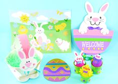 an assortment of easter decorations on a blue background