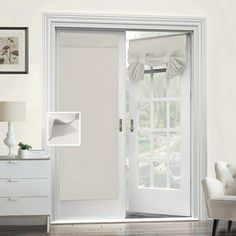 an open white door in a living room