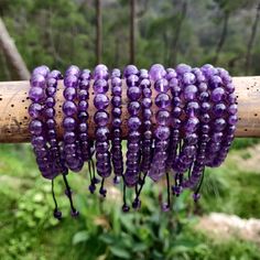 Discover the beauty and power of our handmade, adjustable Amethyst Macrame bracelet, designed to fit both men and women perfectly. Crafted with intention, this bracelet features Amethyst crystals, believed to be a powerful stone that provides protection, stress relief, and spiritual growth. As the February birthstone, it makes a meaningful gift for a loved one or a special treat for yourself! '¨) ¸.*'¸.*'¨) ¸. (¸.*' (¸.*` ♥ *FREE INTERNATIONAL SHIPPING ►►Use the drop-down menu to select your preferred option:  ► Single bracelet with 6mm beads ►Single bracelet with 8mm beads ► Pair- Set of two 6mm bracelets ►Pair-set of two  8mm bracelets,  ►Mixed Pair- set with one 6mm bracelet and one 8mm bracelet ►► Thanks to the drawstring closure, the bracelet's circumference adjusts from a minimum of Single Bracelet, Amethyst Crystals, Macrame Bracelet, Couple Bracelets, Amethyst Bracelet, February Birthstone, Purple Stones, Macrame Bracelets, February Birth Stone