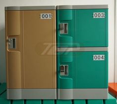 two green and gold filing cabinets sitting side by side