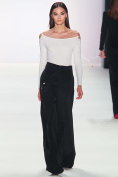 White Off The Shoulder Long Sleeve Top and Black Pants by Cushnie et Ochs, Look #4 Flowing Pants, Week In London, Wide Legged Pants, Flared Denim, Et Ochs, Cushnie Et Ochs, Dressy Pants, Vogue Russia