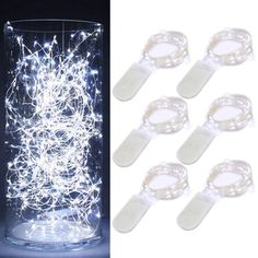 white fairy lights in a glass jar with blue pen and light string attached to it