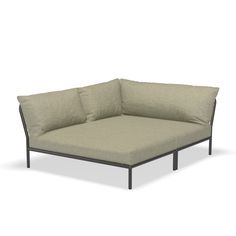 a corner sofa with two pillows on the back and one seat folded out to show off