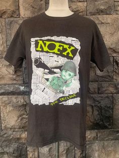 Vintage NOFX Rock Band T shirt Item Condition: Pre-Owned (Used) condition. please see pictures Size on Tag: M, Please check measurement Tag : delta ------------ Measurement: ------------- Chest (Pit to Pit) 20.5" Length  28.5" Shipping: Worldwide ---------- Standard Shipping 14-30 Days Express 5-8 Days I can do combined shipping +Add USD 5 shipping for each additional items! Band T Shirts, Mens T Shirts, Vintage Shirt, 8 Days, Rock Band, Picture Sizes, Favorite Things Gift, Rock Bands, Mens T