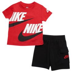 It’s easy to keep your little ones comfy in the Nike NSW Cargo Short Set. Perfect for everyday wear, this outfit is crafted from lightweight French terry and jersey fabric – just the right choice for your mini adventurers to wear all day. Finished up with a handy side cargo pocket, the shorts let you stash your little ones’ tiny belongings with ease. Keep your little darlings looking their best in the casually cool Nike NSW Cargo Short Set. Nike NSW Cargo Short Set features: Soft T-shirt provide Baby Clothes Nike, Nike Toddler Boy Outfits, Nike Athletic Shorts With Built-in Shorts For Streetwear, Baby Boy Clothes Nike, Baby Boy Jackets Nike, Boys Nike Shorts, Cool Nikes, Stylish Kids Outfits, Comfortable Shorts