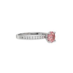 This ring is made with a fancy Pink round solitaire diamond set in four-prong setting, and is complemented by a round pave diamonds band.Details: - Made to Order- Focal Diamond Weight: 1.00 CT, 1.25 CT, 1.50 CT, 1.75 CT, 2.00 CT, 2.50 CT, 3.00 CT- Accent Diamond Weight: 0.22 CT - No Of Diamonds: 19- Diamond Type: Lab Grown Diamond (CVD, HPHT)- Diamond Cut: Round- Diamond Clarity: VS - Focal Diamond Color: Fancy Pink- Accent Diamond Color: Colorless (DEF)- Setting Type: Prong and Pave- Band Thick Promise Rings With Side Stones In Cubic Zirconia, Promise Ring With Side Stones, Promise Diamond Ring With Side Stones In Cubic Zirconia, Cubic Zirconia Diamond Ring With Side Stones For Promise, Prong Set Lab Grown Diamond Ring, Lab Grown Diamond Pave Setting Promise Ring, Lab Grown Diamond Ring With Pavé Setting For Promise, Classic Promise Ring With Side Stones, Timeless Diamond Rings With Side Stones