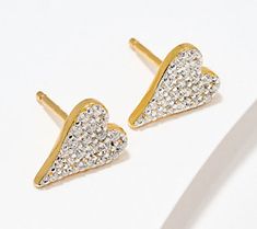 Add a subtle (and sentimental) spot of sparkle to any outfit with these pave heart stud earrings. Chic Heart Drop Earrings For Anniversary, Chic Heart Shaped Drop Earrings For Anniversary, Chic Anniversary Heart Drop Earrings, Elegant Heart Earrings With Sparkling Stones For Valentine's Day, Sparkling Gold Earrings For Valentine's Day, Elegant Sparkling Heart Earrings For Valentine's Day, Valentine's Day Elegant Heart Earrings With Sparkling Stones, Elegant Valentine's Day Heart Earrings With Sparkling Stones, Chic Earrings For Anniversary On Valentine's Day