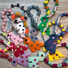 "Do you want to be in the most exclusive club on Etsy? Yes? Then you need these Dino Club perler bracelets  All backs are ironed 🖤 They come in a set of 10 and are completely random in color. You will not get any of the same color in the set, but they will all say \"Dino Club\" ! If you do want specific Wording, there is an additional charge, but you will still get a random selection of colors!" Dino Theme, Exclusive Club, Bead Projects, Kandi Bracelets, Perler Bead Art, Swaggy Outfits, Perler Bead, Perler Beads, Bead Art