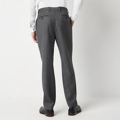 Crafted from a wool-blend with stretch, these wrinkle-resistant suit pants from Collection by Michael Strahan to the office or social outings. They are cut in a modern-fit with a comfort waistband, a button-zip fly, and side and back pockets. Wear them with a button-down or a t-shirt.Front Style: Flat FrontFeatures: Fly Front, Wrinkle Resistant, Stretch Fabric, Comfort WaistbandClosure Type: ButtonFit: Modern FitPockets: 2 Back Slip Pockets, 2 Side Slip PocketsRise: At WaistFiber Content: 52% Wo Wool Suits For Work With Straight Leg, Wool Suits With Straight Leg For Work, Wool Suits With Straight Leg, Workwear Trousers In Suiting Fabric, Wool Business Casual Suits With Tapered Leg, Wool Tapered Leg Business Casual Suit, Wool Tapered Leg Suits For Business Casual, Tailored Business Bottoms In Suiting Fabric, Wool Suits With Straight Pants For Work