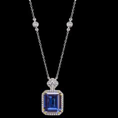 Royal Blue Sapphire, CZ White Gold Plated Emerald Halo Pendant With 18" Necklace Formal Blue Jewelry With Large Pendant, Blue Jewelry With Large Pendant For Formal Occasions, Blue Sapphire Pendant Necklace, Blue Tanzanite Pendant Jewelry, Formal Blue Tanzanite Necklace, Elegant Blue Tanzanite Necklace, Blue Gemstone Pendant Necklace, Blue Pendant Fine Jewelry, Blue Necklace With Large Pendant