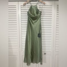 Semi-Formal Midi Dress From Lulus Wedding Guest Collection. Color Is Light Green. Very Open Back With Cross-Cross Thin Straps. Zip On Side. Brand New Never Worn With Tags On. Lulus Wedding, Dresses Lulus, Midi Dress Formal, Lulus Dresses, Green Satin, Halter Neck, Semi Formal, Wedding Guest, Light Green