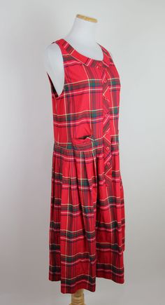 "Adorable vintage 80s red plaid cotton sundress! Lightweight cotton fabric. Dropwaist. Hip pockets. Midi length. Pullover style. Made in USA.   + + + + + DETAILS + + + + +   Vintage condition: Excellent! Light general wear. No visible stains, holes or discoloration.  Era: 1980s / 1990s  Label: Eileen West Tag Size: Medium  Fits like a Modern Size: Small Material: Cotton    + + + + + MEASUREMENTS + + + + +    Bust: 36\" Waist: 36\" Hips: free Length: 44\""