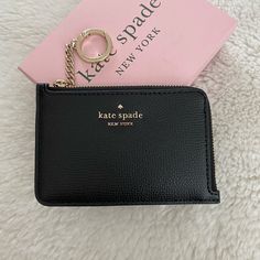 Brand New With Tag Kate Spade Card Holder With Key Ring. For Stashing Cards, I.D, Folded Bills, And Coins Offers Welcome! Kate Spade Coin Purse With Card Slots, Kate Spade Rectangular Coin Purse For Everyday, Kate Spade Bifold Coin Purse, Kate Spade Black Bag With Card Slots, Kate Spade Coin Purse With Card Slots As Gift, Black Card Holder With Key Clip For Travel, Kate Spade Black Wallet With Interior Card Slots, Daily Use Black Card Holder With Key Clip, Black Card Holder With Key Clip For Daily Use