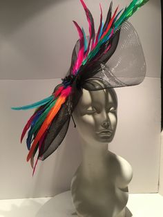 Multi color Fascinator- Large Brim- Breeders Cup- Wedding Fascinator- Cocktail Hat - Kentucky Derby- Horse Races Hello, Have fun walking into your next party/event wearing this big bright stunning fascinator. It will definitely be a head turner! This feather fascinator is about 20 inches round. It has feathers scattered It is center....it's attached to a skinny adjustable headband that is wrapped in satin and is very comfortable. ------------------------------------------------- I ship US Postal Fitted Fascinator For Carnival And Evening, Fitted Headpieces For Carnival And Formal Occasions, Fitted Headpieces For Kentucky Derby And Parties, Formal Carnival Headpiece, Feathered Fascinator For Royal Ascot Party, Kentucky Derby Fascinator With Feathers For Party, Fitted Fascinator For Royal Ascot Party, Royal Ascot Party Fascinator With Feathers, Kentucky Derby Party Fascinator With Feathers