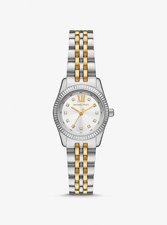 The Lexington watch exudes everyday glamour with its silver and gold hues and sparkling pavé accents. Made entirely of stainless steel, this mini timepiece boasts a round face with a beveled topring and a two-tone bracelet strap. Slip it on to give both day and night outfits a dose of sophisticated charm. Gold And Silver Watch, Amazon Orders, Michael Kors Lexington, White Watch, Engagement Ring Cuts, Two Tone Watch, Watch Model, Chronograph Watch, Michael Kors Watch