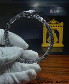 This Exclusive Ouroboros Snake Ring is Made of 925 Sterling Silver with High Polish Yellow Gold Micron Plated. ❤Metal Type - Real Sterling Silver S925, Ring Stamped With 925 ❤Band Color: Silver Oxidized, Gold Vermeil ❤For Fast Delivery Kindly Pay 30.00 USD Extra ❤The Pictures are in the Same Color & Quality ❤This is a beautiful Bracelet ❤ This ring is marked 925. Occasion: Christmas Day Gift, Father's Day, Mother's Day,  Biker Lover Ring, Anniversary Gift For Him/Her We can make personalized pendants and rings in case of special requests. Do not hesitate to contact us for more information and to learn how to create your jewel. ✦ Returns Cancellations ✦ * Return option available for 3 days after the delivery. It has to be on my hands in 14 days after dispatch. * The product has to be in the Ouroboros Bracelet, Ouroboros Snake, Snake Bracelet, Women Bracelet, Personalized Pendant, Snake Ring, Bracelet For Men, Anniversary Gifts For Him, Wild Animal