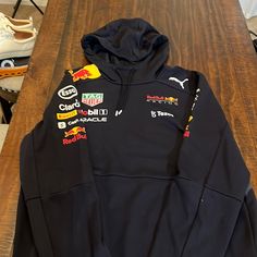 Pre-Owned 100% Authentic, Redbull Racing Team Hoodie. Officially Licensed Puma. Size Us Large. Ferrari Merch, Formula 1 Hoodie, F1 Clothing, F1 Hoodie, Redbull Racing, Car Hoodie, F1 Merch, Race Day Outfits, Hoodie Jacket Men