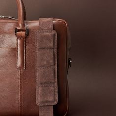 The Gazeli Briefcase; functional minimalist design, made for daily use, perfect for travel or work. Features a laptop divider, padded shoulder straps and bottom, slim profile, and a quick access front pocket. Our designer briefcase is the perfect gift for men that love clean designs: simple and functional. Handcrafted in our workshop by skilled artisans. Outstanding attention to detail and premium materials makes it a unique piece. Luggage Strap, Laptop Briefcase, Umbrella Holder, Luggage Straps, Leather Briefcase, Work Bag, Custom Monogram, Handcrafted Leather, Modern Man