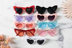 These cute heart sunglasse will be perfect for the bride and all of her babes! With so many colors to choose from, there's a shade to match every theme! Think of all the fun selfies you guys will take in your matching glasses all while looking so friggen cute! Cute Party Sunglasses With Tinted Lenses, Playful Sunglasses For Valentine's Day Party, Playful Party Sunglasses For Valentine's Day, Playful Valentine's Day Party Sunglasses, Bridesmaid Sunglasses, Fun Selfies, Sunglasses Bride, Bride Sunglasses, Bachelorette Party Sunglasses