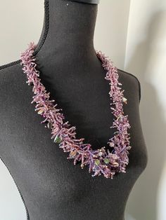 This beaded statement Bib necklaces is great for dressing up your party dresses with wow-effect. The necklace is beaded using Czech glass seed beads, glass flowers and glass leaves. Purple lilac colors combination makes this necklace rich, bright with luxurious look. The necklace measures approximately 72 cm. It is called a statement necklace for a reason--it is unique, chunky, and grabs all the attention, making it a defining piece of your outfit. Pick the style that reflects you or, alternativ Purple Beaded Chain Jewelry For Party, Bohemian Purple Necklaces For Parties, Bohemian Purple Necklace For Party, Purple Jewelry With Colorful Beads For Party, Purple Party Jewelry With Colorful Beads, Party Beaded Necklaces With Bead Caps And Round Beads, Party Beaded Necklaces With Bead Caps, Party Beaded Necklaces With Colorful Crystal Beads, Crystal Beaded Necklaces For Party With Round Beads