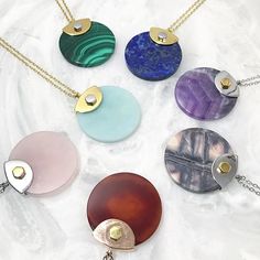 Round it out. Featuring a large circular semi-prescious stone held in place by industrial detailing, this pendant is one of the easiest ways to add dimension and a touch of color to any outfit. Shop you favorite colors at wbritt.com today! Dynamics - wbritt #Minimalistic #Simple #Chic #Elegant #Luxury #Modern #nyc #Fashion #Regram #Classy #Trendy #Jewelry #angle #rings #collections #new #style #fashion #ootd #lookbook #newlook #accessories #silver #gold #geometricjewelry #gift #design Stone Circle, Outfit Shop, Accessories Silver, Gift Design, Circle Pendant Necklace, Simple Chic, Geometric Jewelry, Nyc Fashion, Circle Pendant